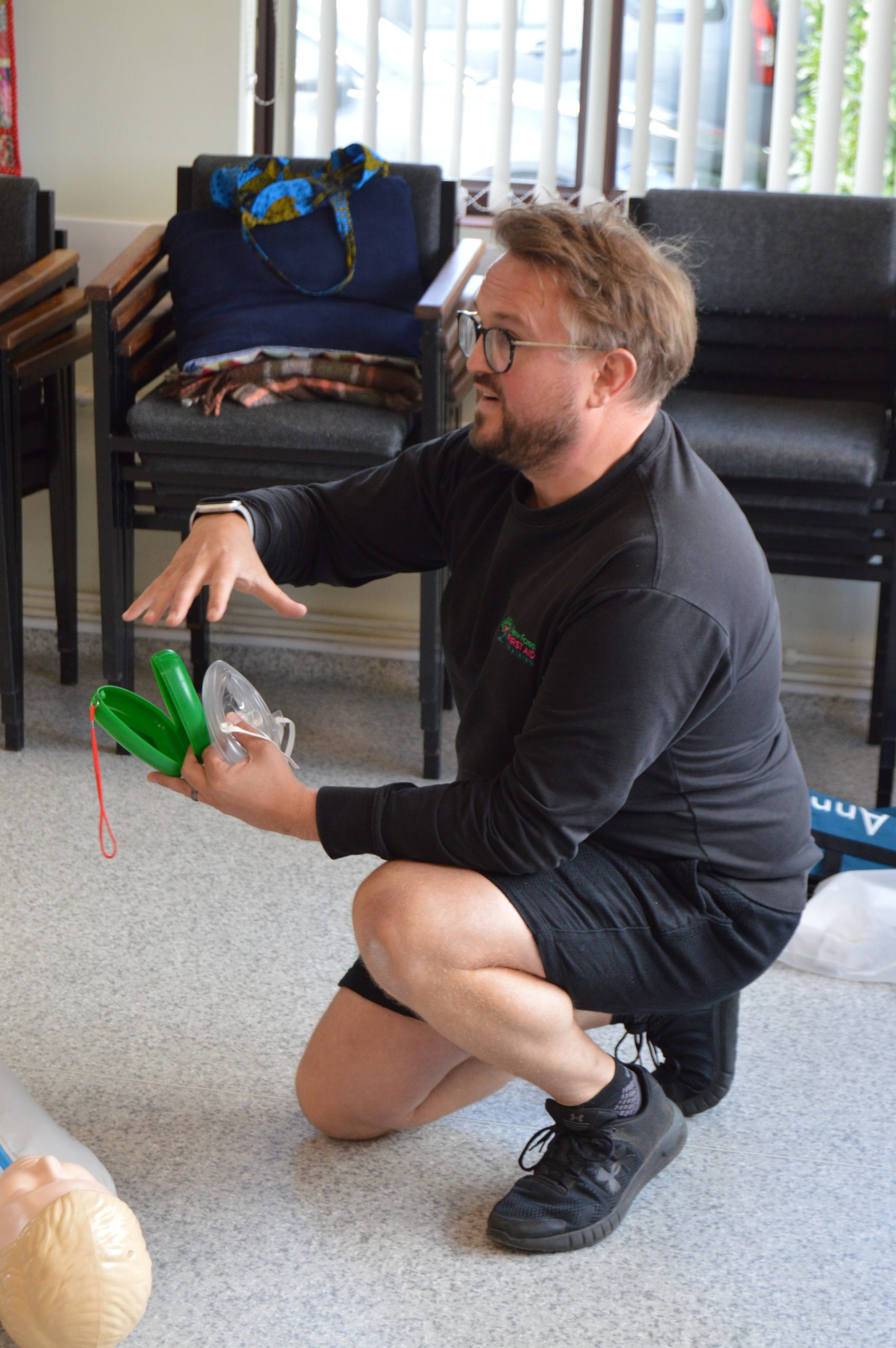 Joe showing mask. First Aid training EFAW