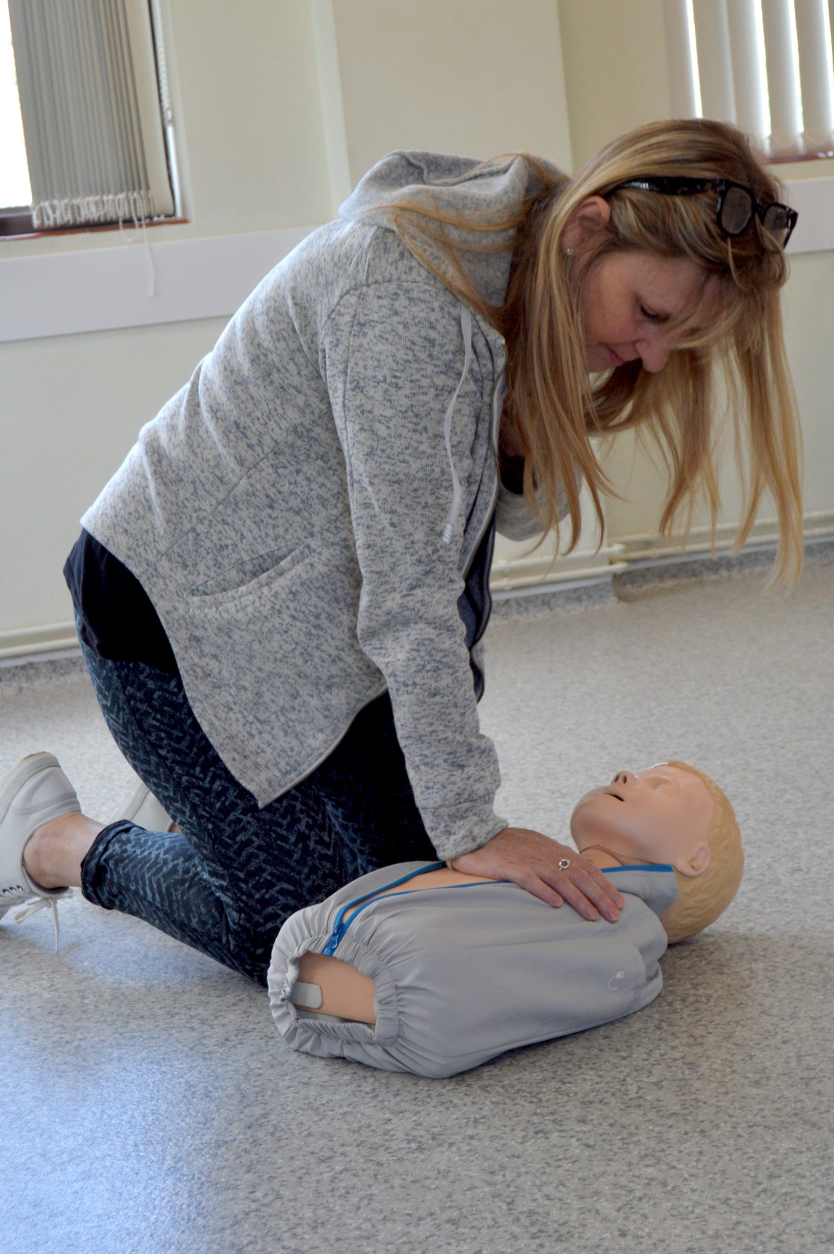 Paediatric child signal arm compressions. Paediatric First Aid training. CPR Training